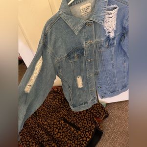Distressed denim jacket